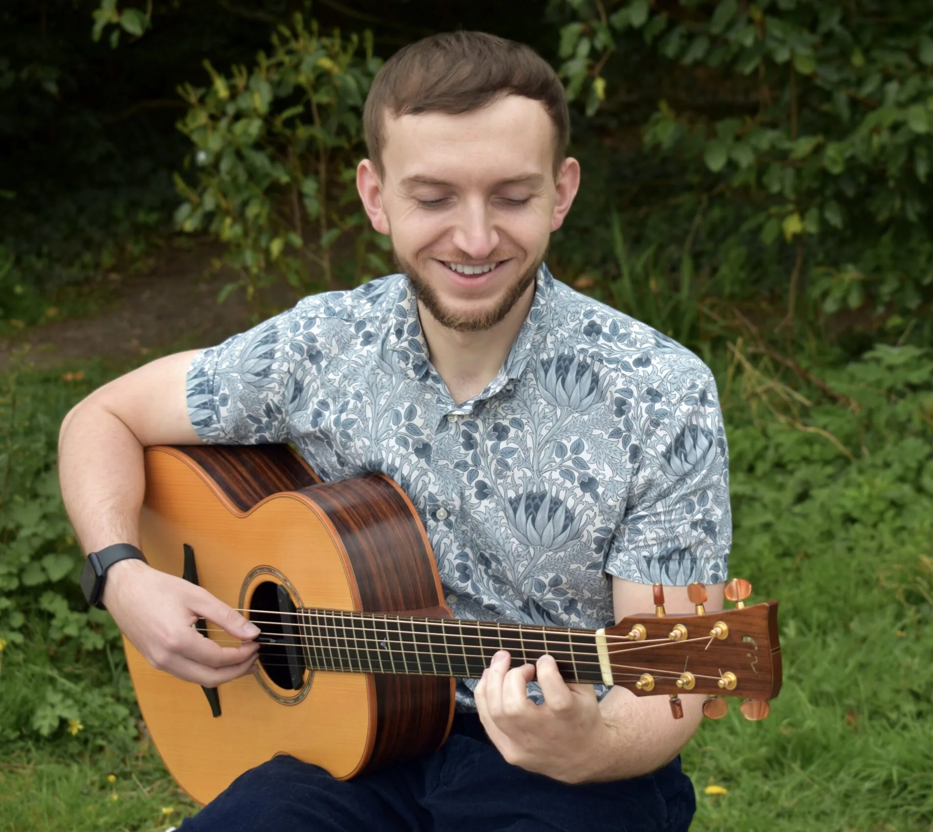 Luke Edwards playing guitar